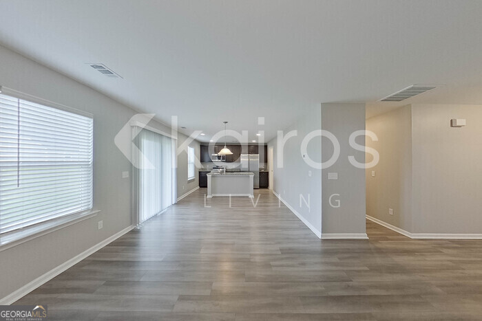 105 Colonial Way Springfield, GA 31329 - Photo 8 of 30 a view of a room with wooden floor