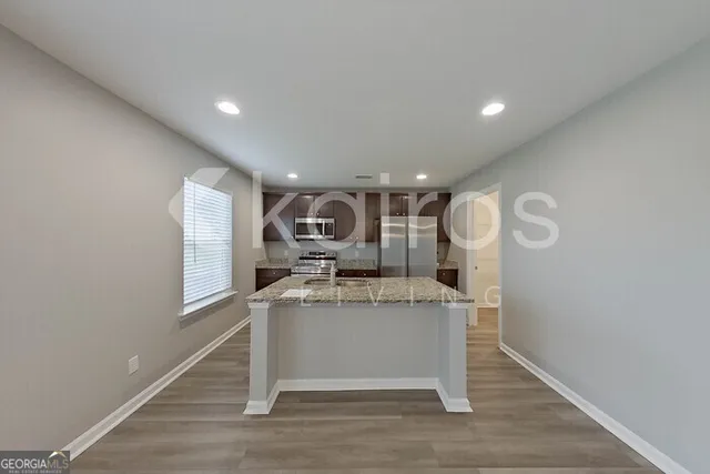 a view of kitchen with breakfast area