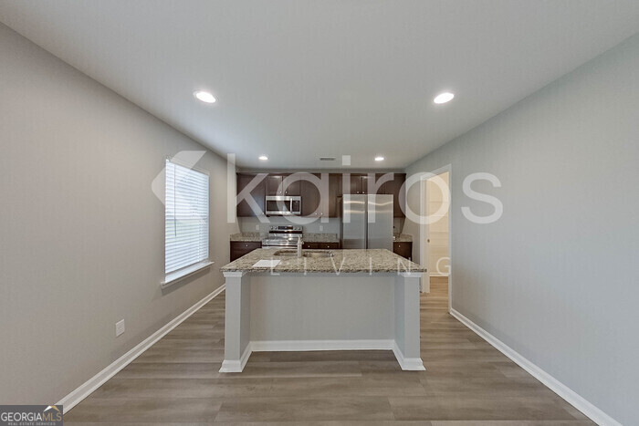 105 Colonial Way Springfield, GA 31329 - Photo 9 of 30 a view of kitchen with breakfast area