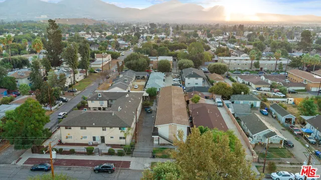 an aerial view of a house with a garden