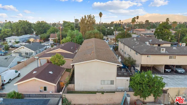 an aerial view of a house with a garden