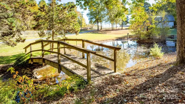 a view of swimming pool with a yard