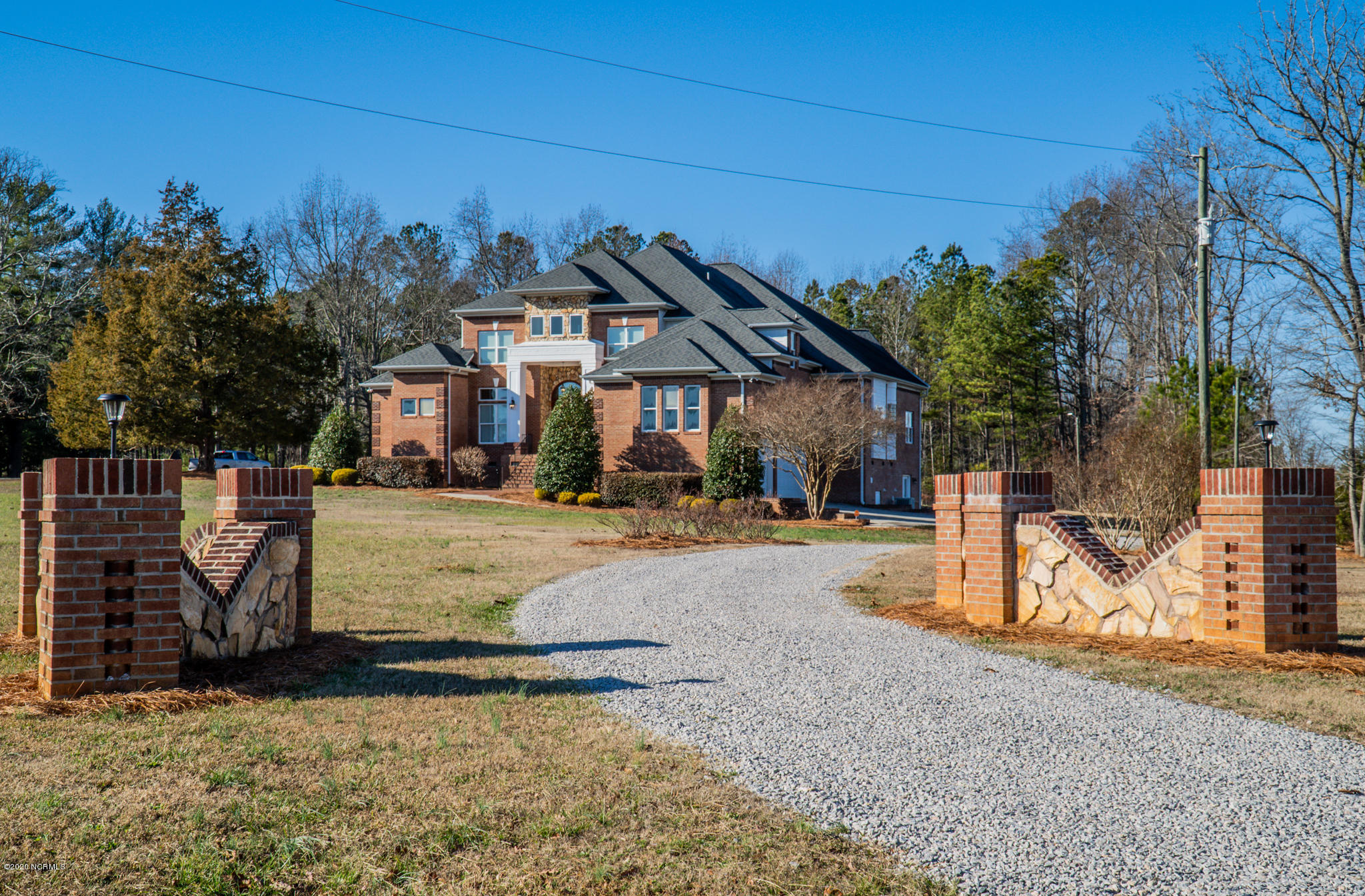 521 Slick Williams Road Macon, NC 27551 - Photo 1 of 78 Main entrance on corner lot