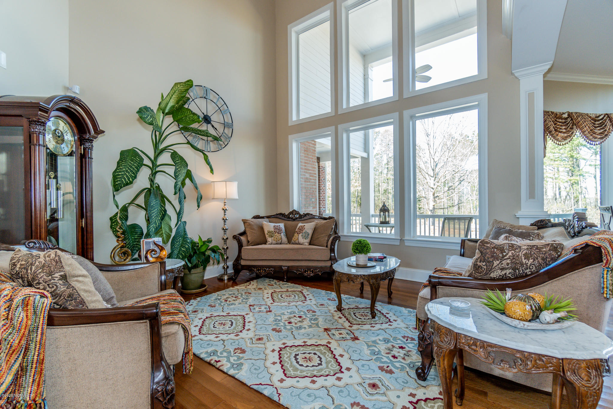 521 Slick Williams Road Macon, NC 27551 - Photo 18 of 78 Living room/sunroom with arches