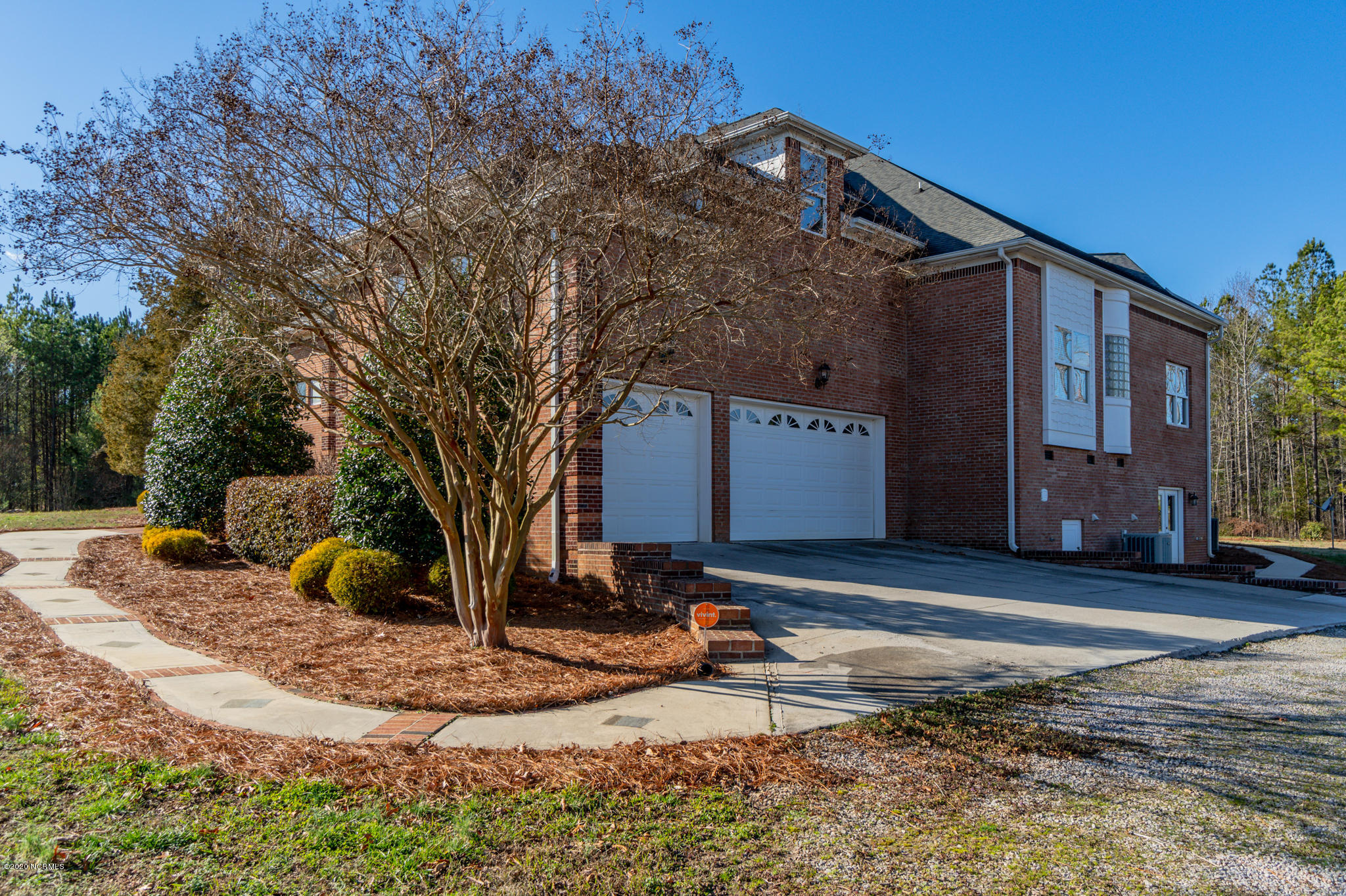 521 Slick Williams Road Macon, NC 27551 - Photo 3 of 78 Garage view & 2 door side basement entry
