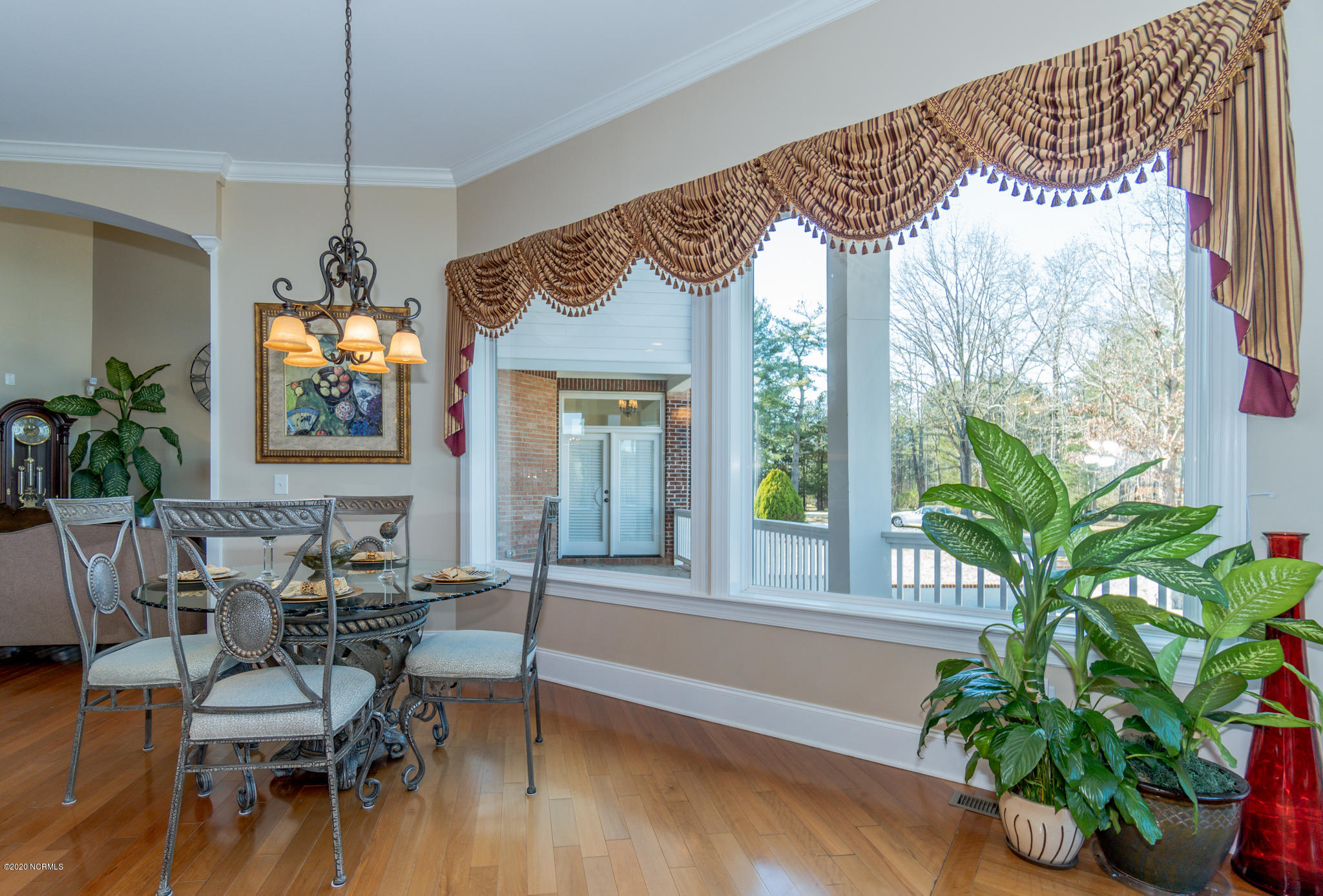 521 Slick Williams Road Macon, NC 27551 - Photo 33 of 78 Breakfast wall to wall windows