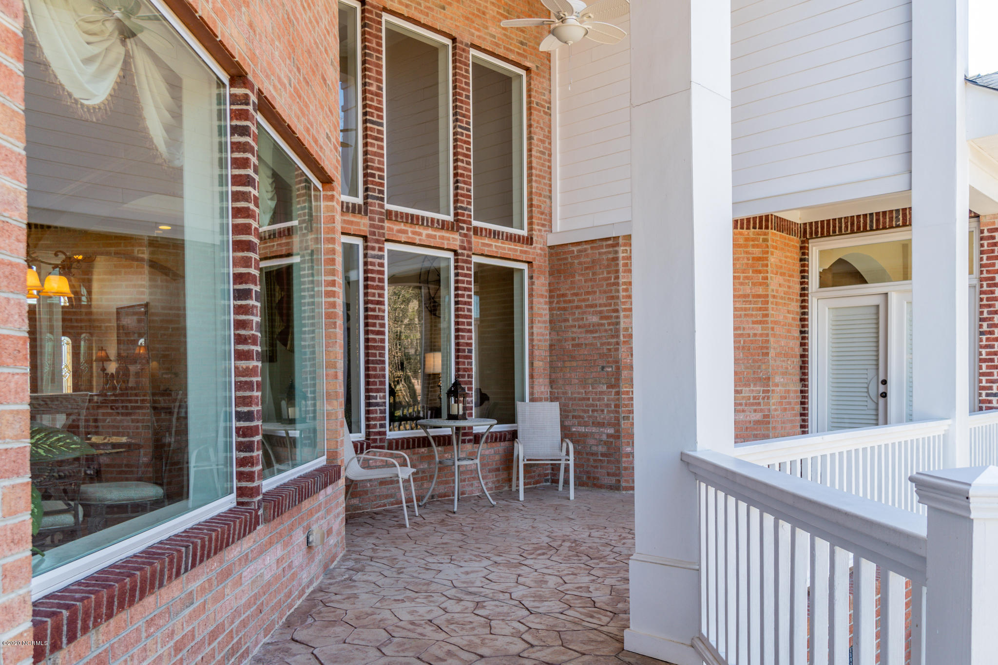 521 Slick Williams Road Macon, NC 27551 - Photo 9 of 78 Rear porch with stone floor