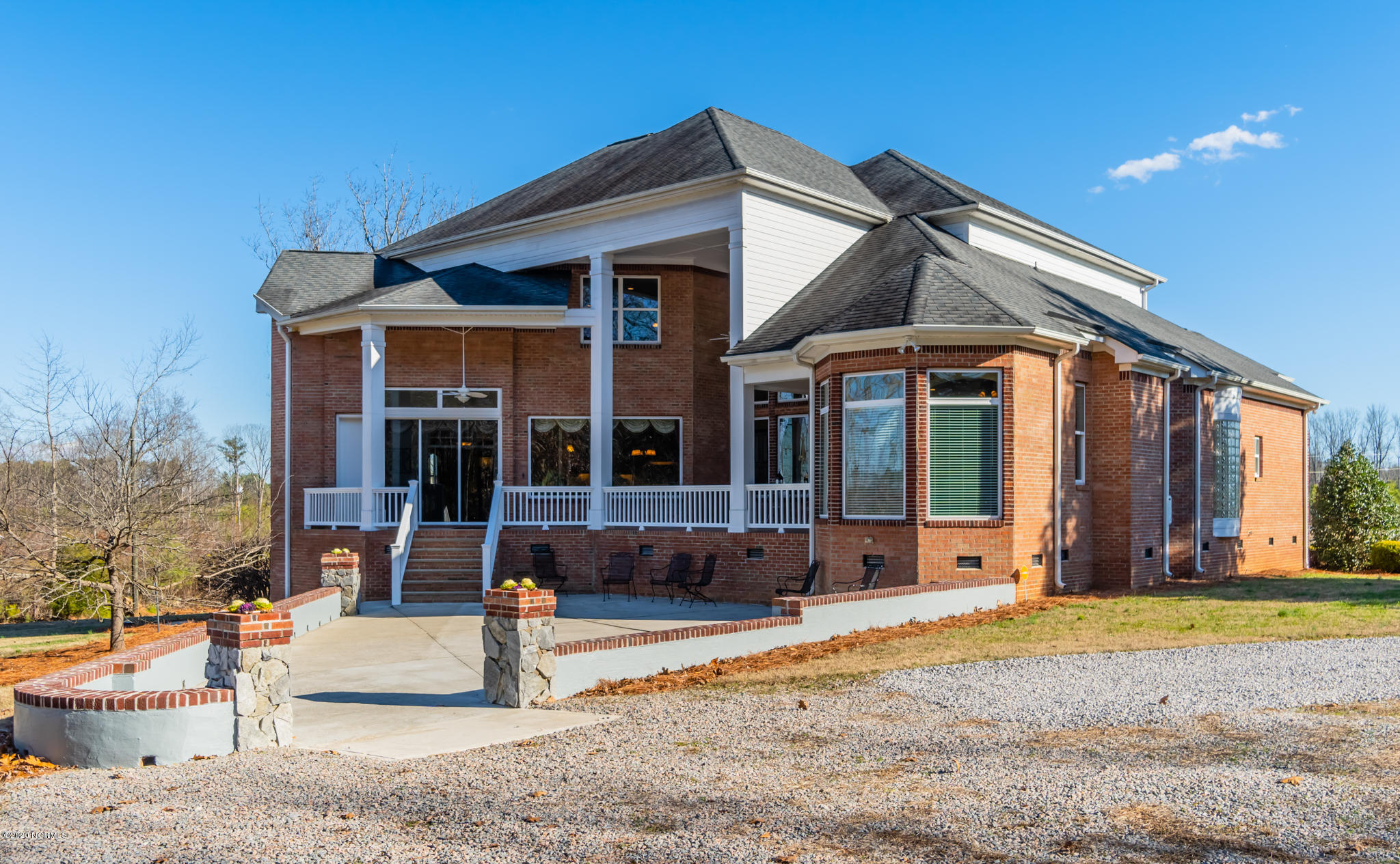 521 Slick Williams Road Macon, NC 27551 - Photo 10 of 78 Rear view stone pillars