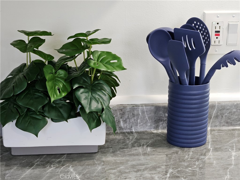 3825 Valley Boulevard, Unit 25 Walnut, CA 91789 - Photo 12 of 15 a vase of flowers sitting on a table