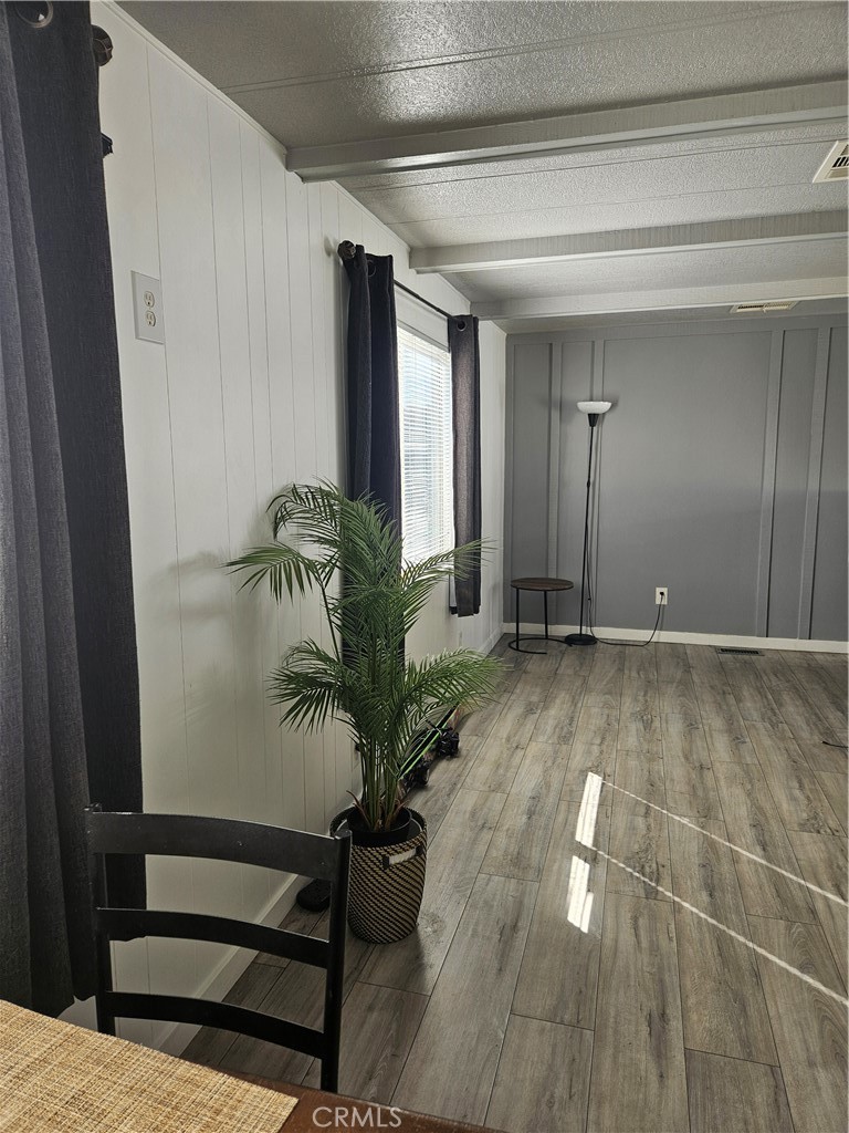 3825 Valley Boulevard, Unit 25 Walnut, CA 91789 - Photo 3 of 13 a view of entryway with wooden floor