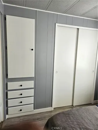 a view of an empty walk in closet