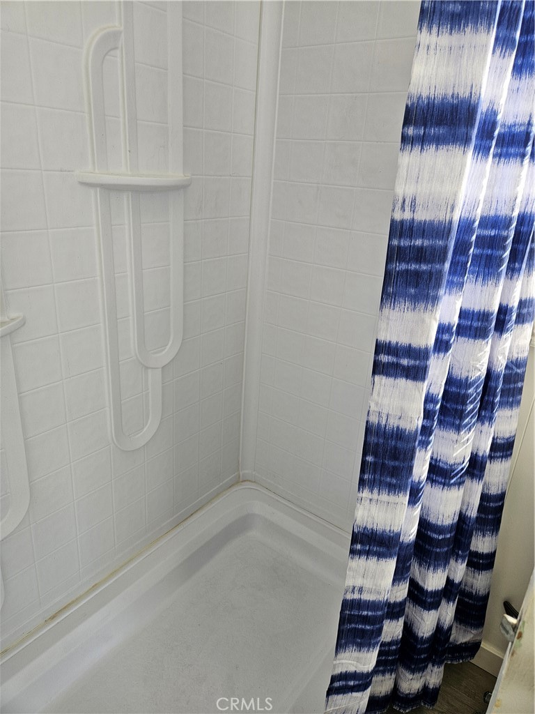 3825 Valley Boulevard, Unit 25 Walnut, CA 91789 - Photo 8 of 15 a bathroom with a shower