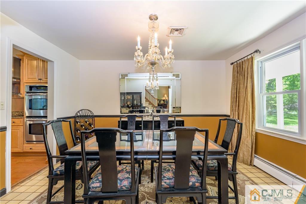 34 Lemon Road Farmingdale, NJ 07727 - Photo 4 of 29 a view of a dining room with furniture window and outside view