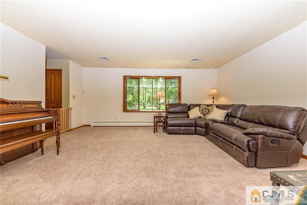 34 Lemon Road Farmingdale, NJ 07727 - Photo 5 of 29 a living room with furniture and a window