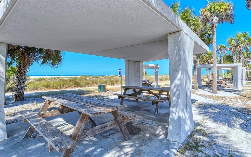 9034 Midnight Pass Road, Unit 6 Sarasota, FL 34242 - Photo 39 of 58 swimming pool view with a outdoor seating