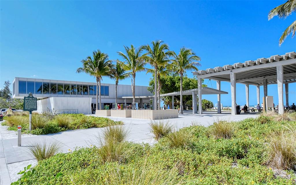 9034 Midnight Pass Road, Unit 6 Sarasota, FL 34242 - Photo 46 of 58 a view of a house with swimming pool and sitting area