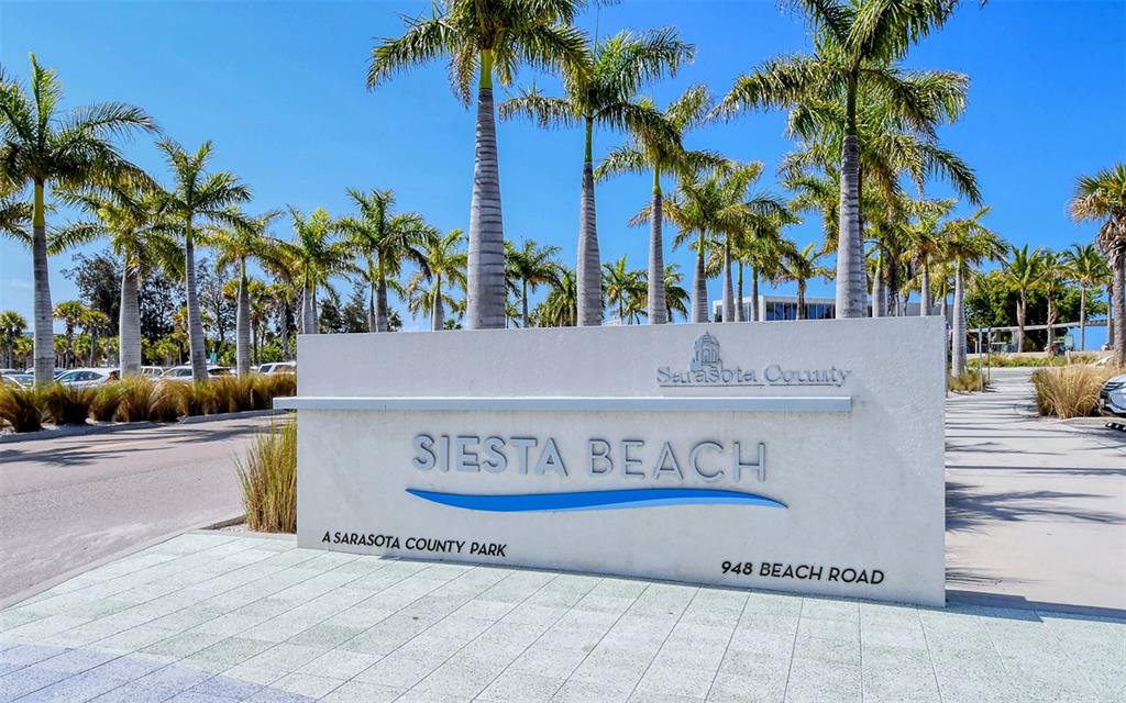 9034 Midnight Pass Road, Unit 6 Sarasota, FL 34242 - Photo 52 of 58 a view of outdoor space with palm trees