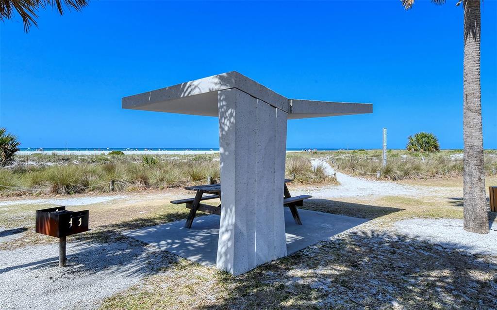 9034 Midnight Pass Road, Unit 6 Sarasota, FL 34242 - Photo 57 of 58 a view of a road with an ocean view