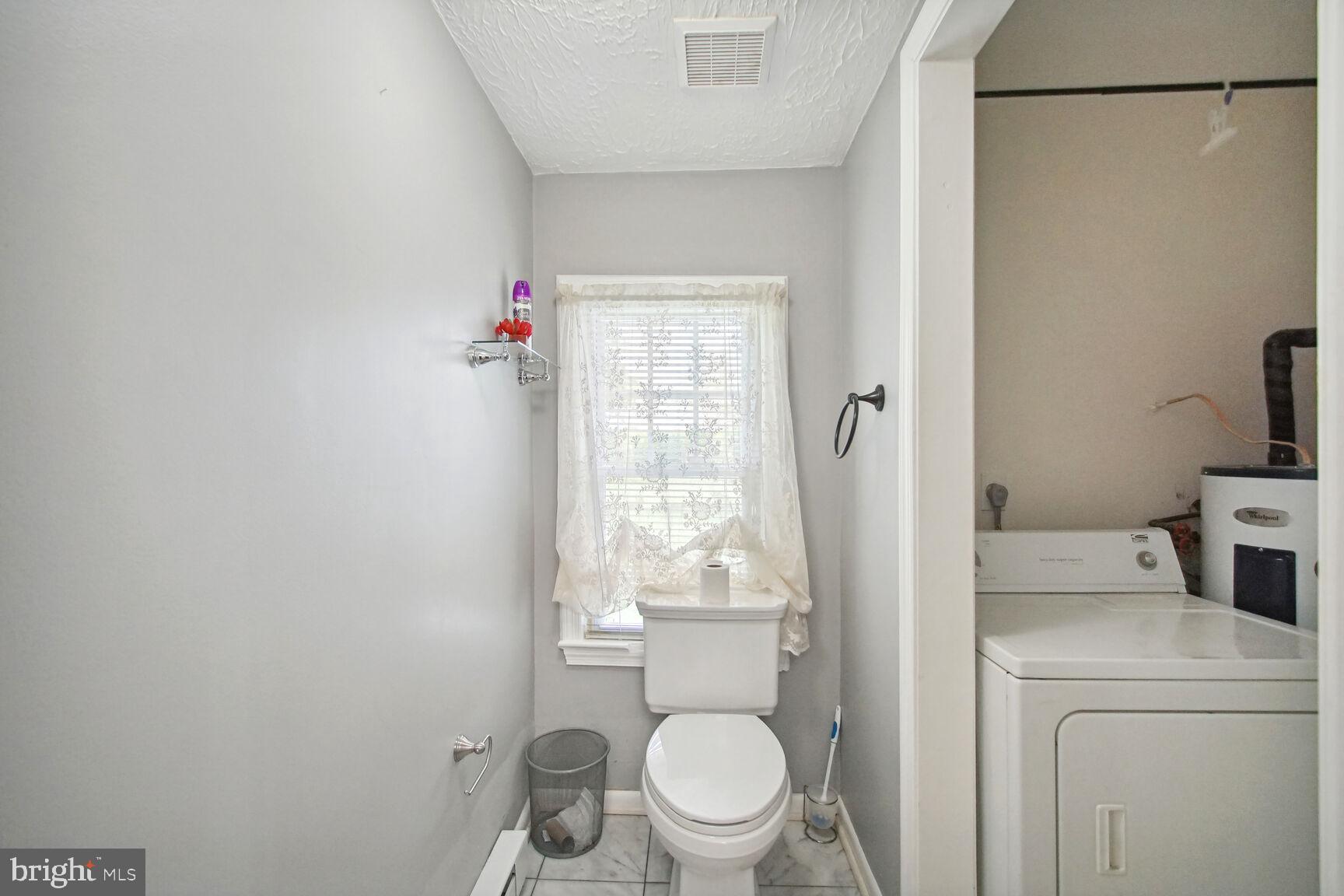 10112 Brandywine Road Clinton, MD 20735 - Photo 16 of 25 Combo powder room and laundry room.