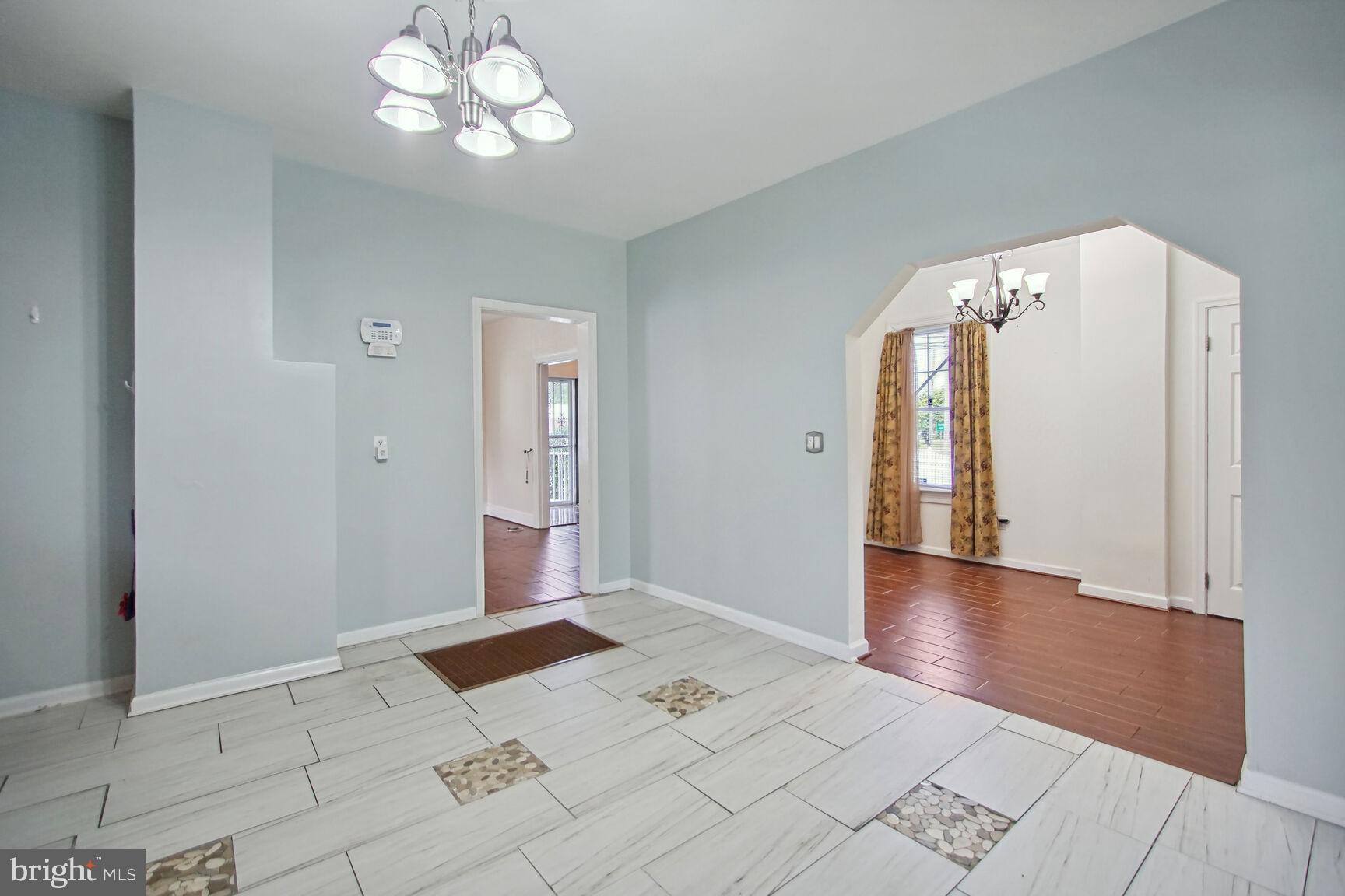 10112 Brandywine Road Clinton, MD 20735 - Photo 10 of 25 Easy access through archway to dining room.