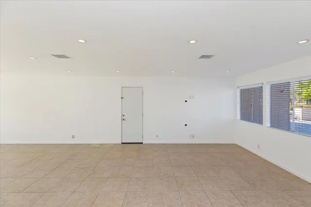 an empty room with window