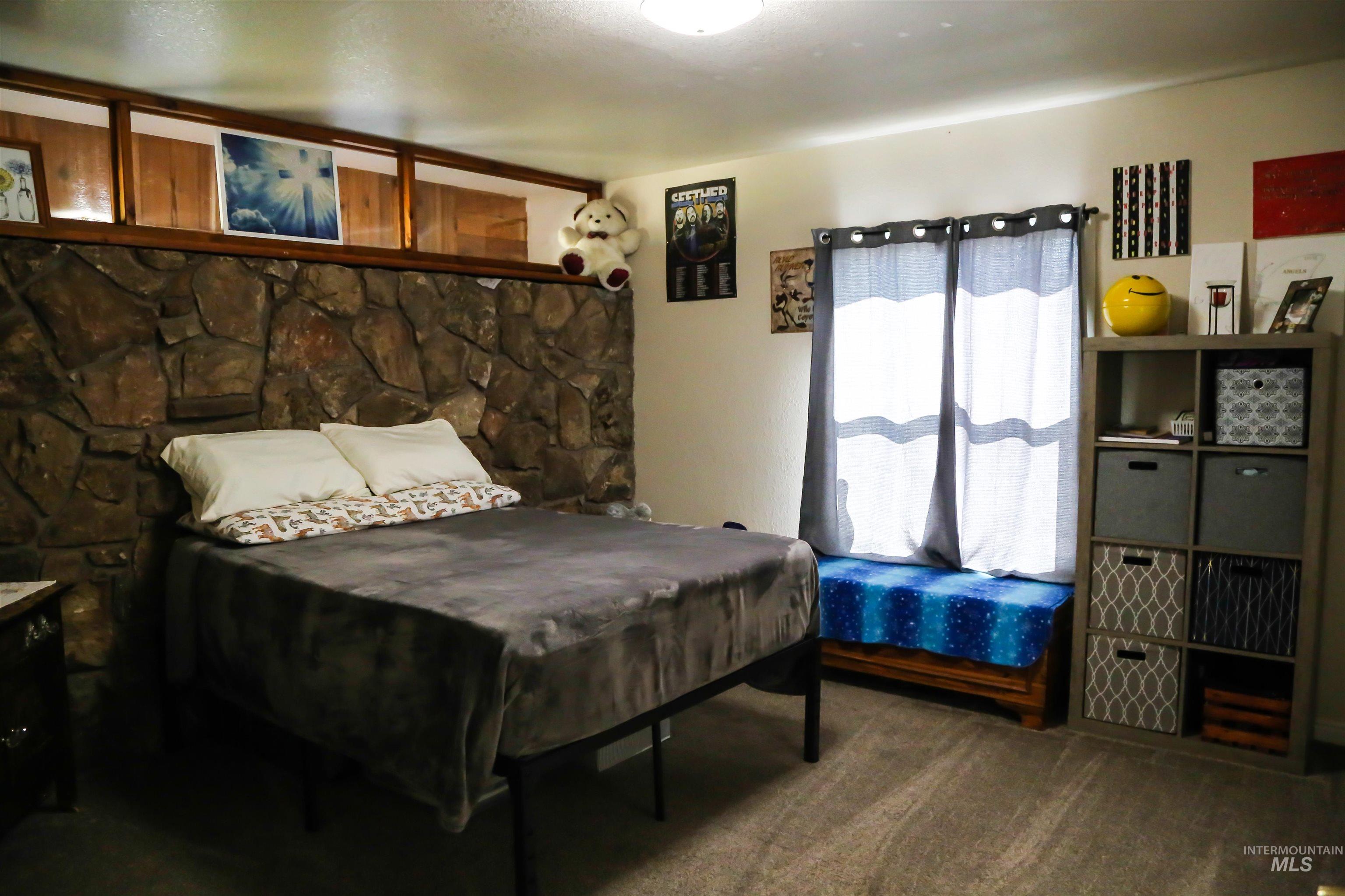 2060 Missman Road Council, ID 83612 - Photo 23 of 50 Bedroom with dark carpet