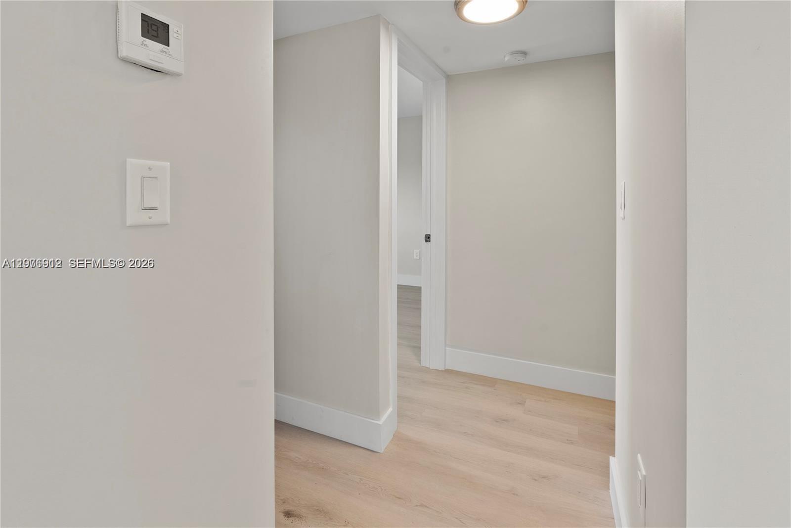 1101 Northeast 80th Street, Unit 201 Miami, FL 33138 - Photo 8 of 17 a view of an empty room