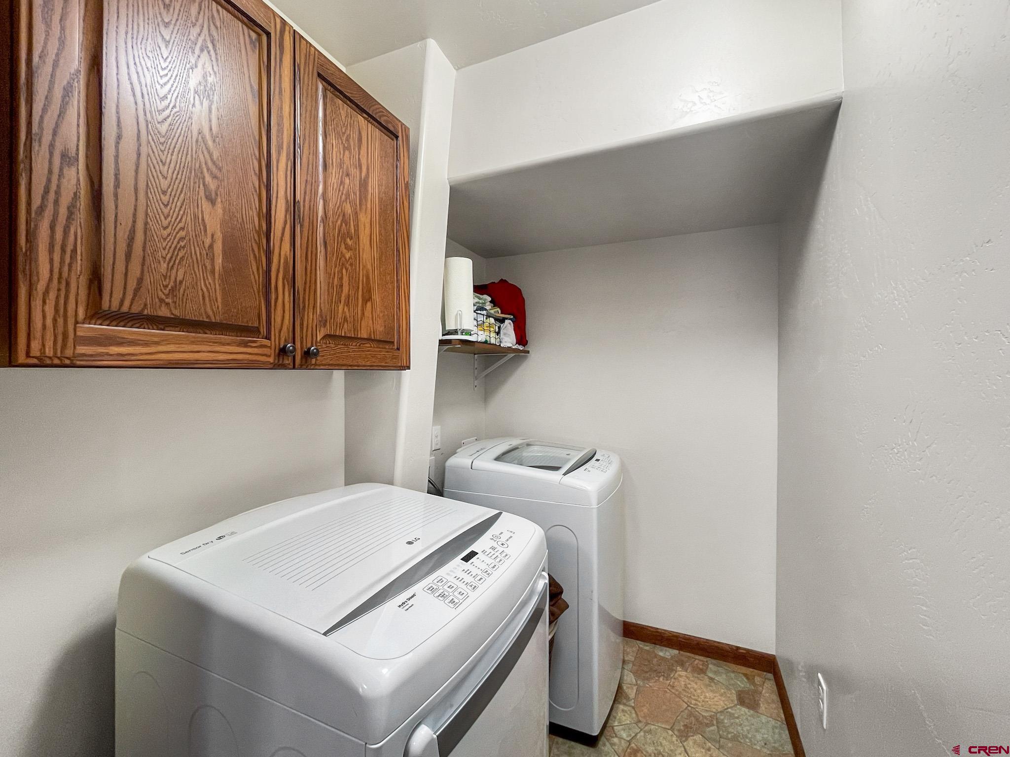 2984 Black Canyon Road Crawford, CO 81415 - Photo 20 of 35 a utility room with dryer and washer