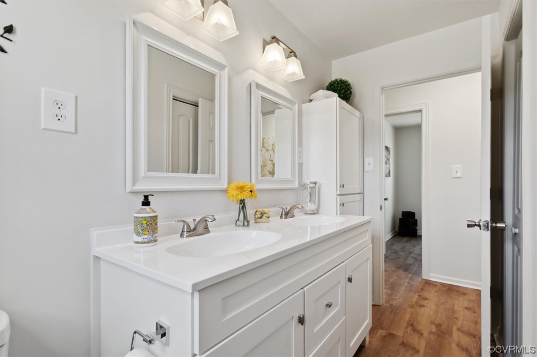 206 Mildred Drive Williamsburg, VA 23188 - Photo 14 of 34 a bathroom with a sink vanity and a mirror