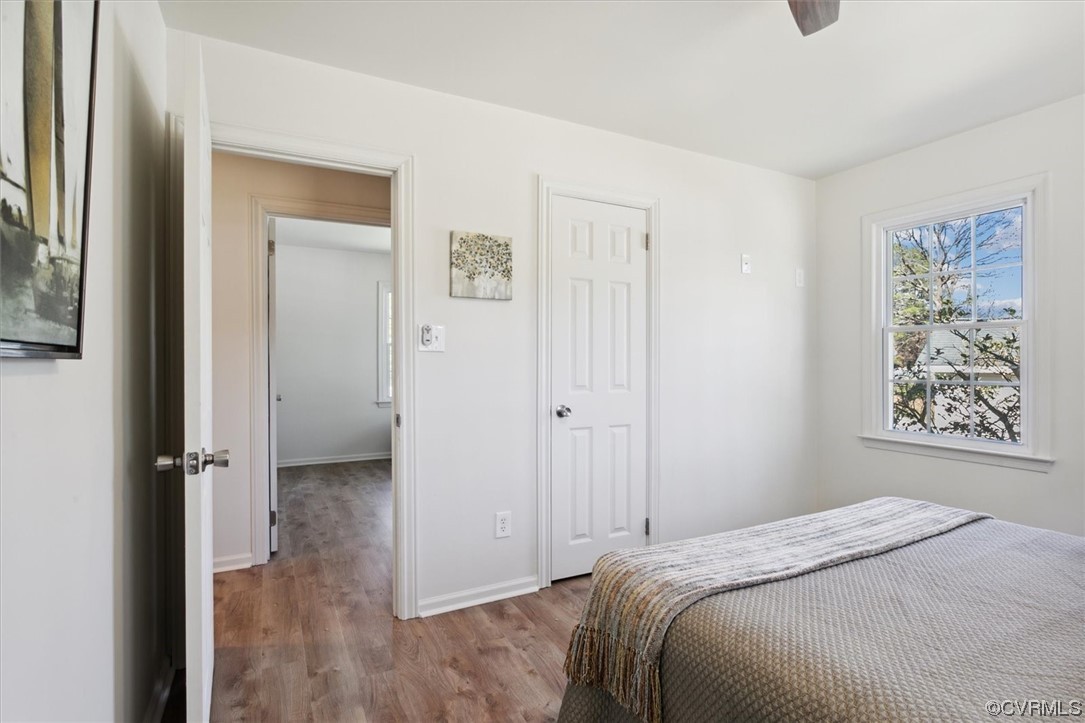 206 Mildred Drive Williamsburg, VA 23188 - Photo 17 of 34 a bedroom with a bed and a painting on the wall