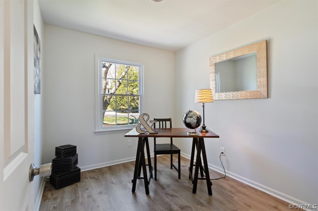 206 Mildred Drive Williamsburg, VA 23188 - Photo 19 of 34 a view of a workspace with furniture and a window