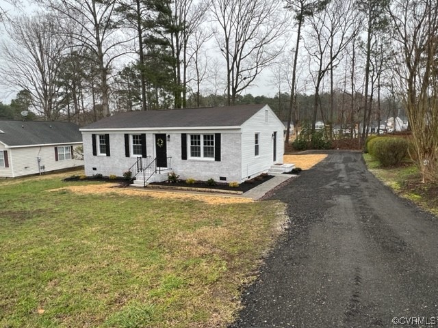 206 Mildred Drive Williamsburg, VA 23188 - Photo 24 of 34 front view of a house with a yard