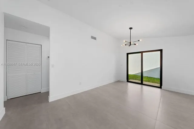 a view of an empty room with window