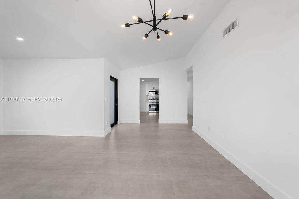 13338 Southwest 113th Place Miami, FL 33176 - Photo 26 of 32 a view of a big room with carpet