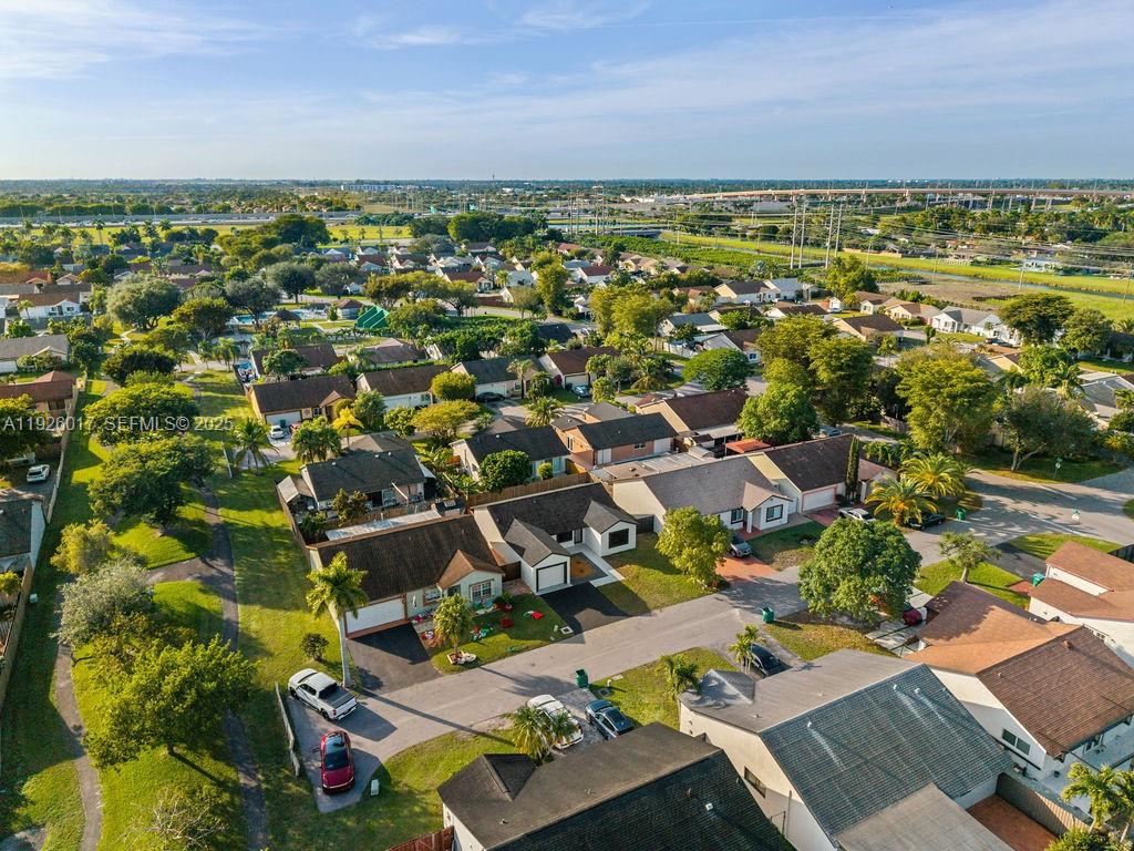 13338 Southwest 113th Place Miami, FL 33176 - Photo 4 of 32 an aerial view of residential houses with outdoor space