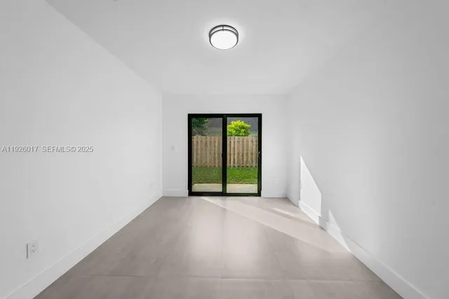 a view of a room with a window