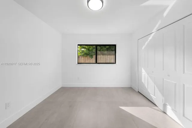 an empty room with a window