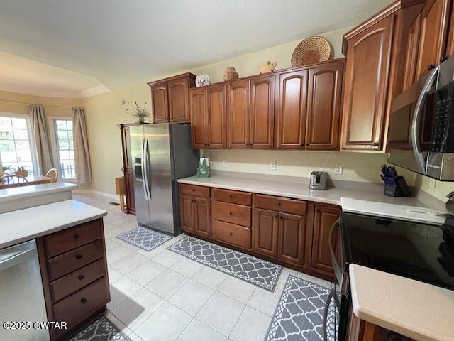 90 Links Bend Way Springville, TN 38256 - Photo 24 of 44 a kitchen with stainless steel appliances a refrigerator and wooden cabinets