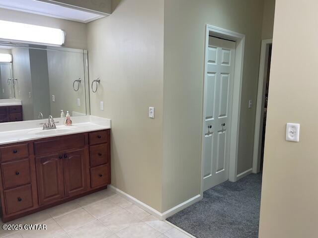 90 Links Bend Way Springville, TN 38256 - Photo 33 of 44 a bathroom with a double vanity sink and mirror