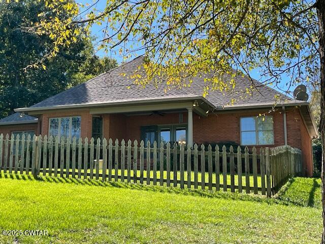 90 Links Bend Way Springville, TN 38256 - Photo 5 of 44 a front view of a house with a garden