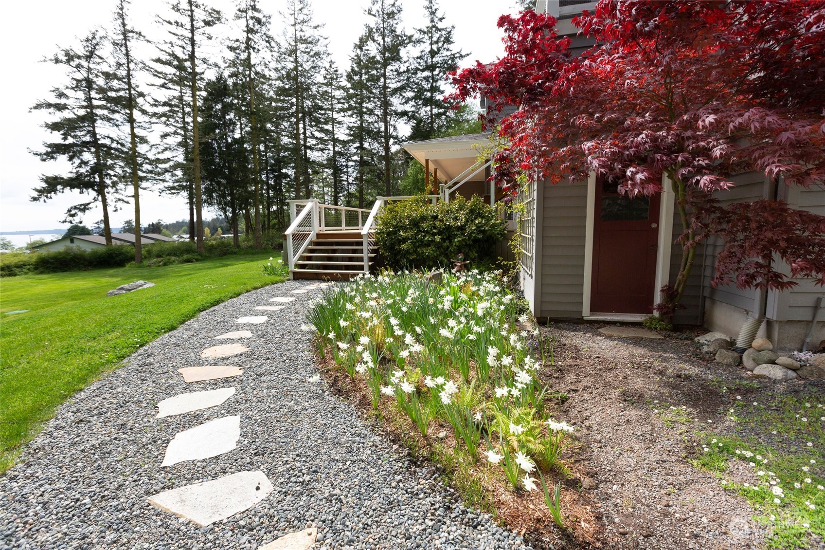 2858 Pear Point Road Friday Harbor, WA 98250 - Photo 7 of 40 a view of a house with a yard