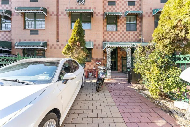 a view of a building with sitting area