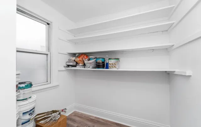 a view of entryway with wooden floor