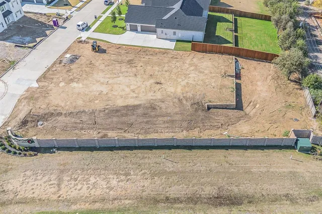 a view of a pool and an outdoor space