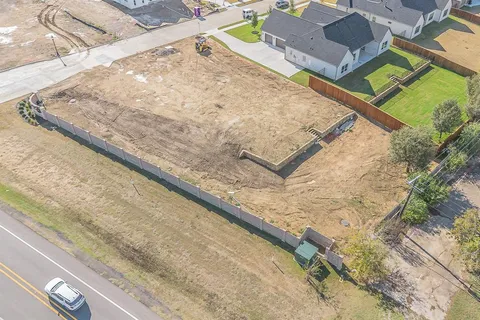 a view of swimming pool with a yard