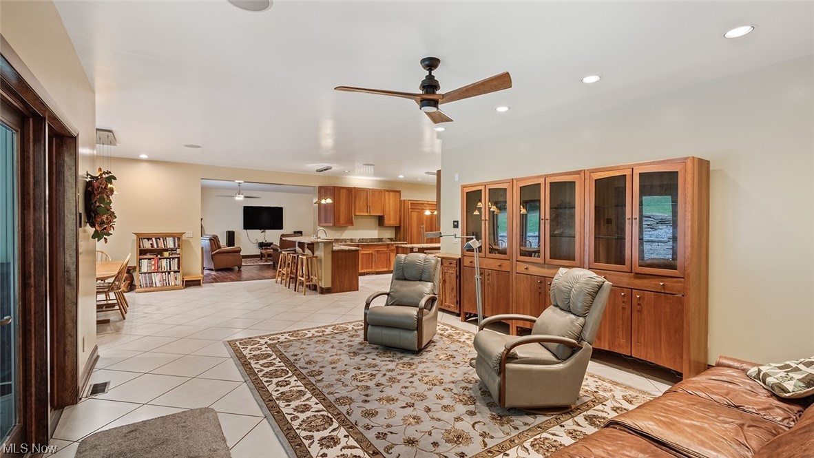 57430 Ohio Riverview Road Shadyside, OH 43947 - Photo 12 of 35 Living room featuring ceiling fan and light tile floors