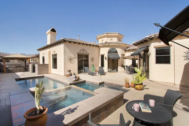 a view of a living room and dining room