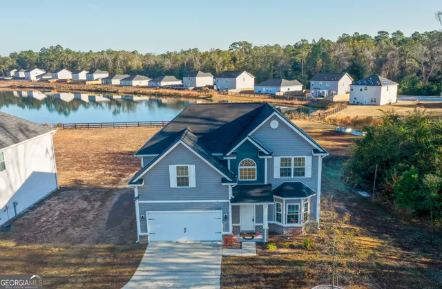 a front view of a house with a ocean view