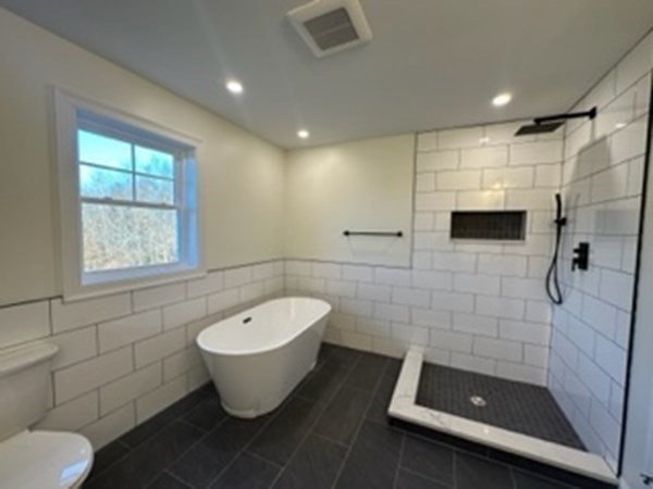1479 Main Street Acushnet, MA 02743 - Photo 15 of 23 a bathroom with a toilet sink and shower