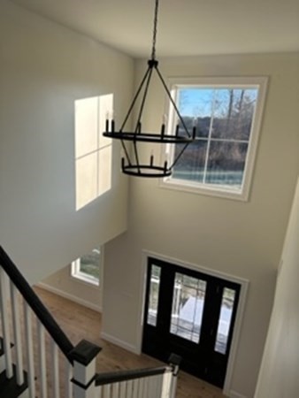 1479 Main Street Acushnet, MA 02743 - Photo 9 of 23 a living room with a bed and a window
